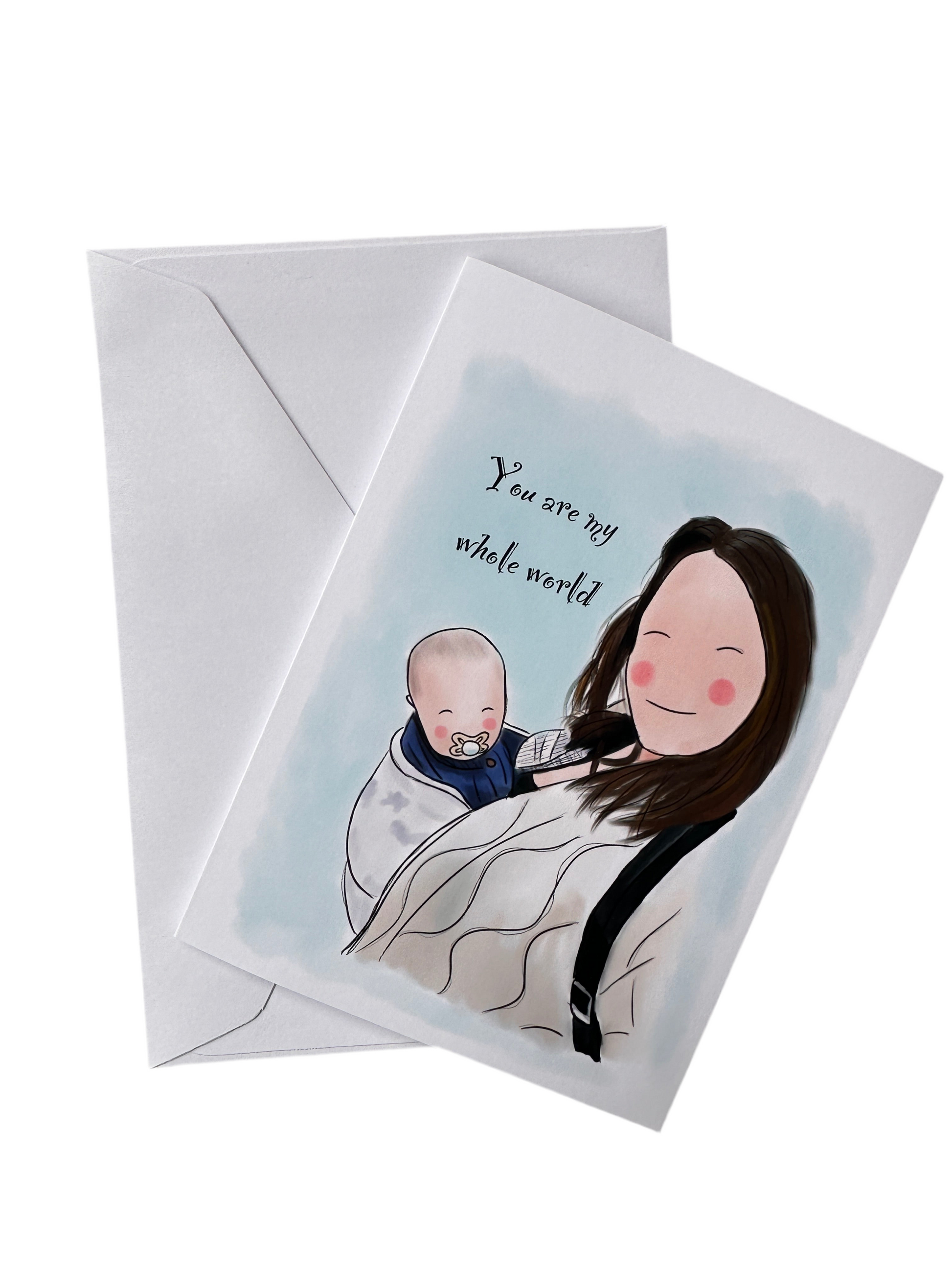 Mother and baby illustration card and envelope. Mother has brown hair and light beige jacket and is carrying little baby in a white carrier on her chest. Light blue background and the text says You are my world. 